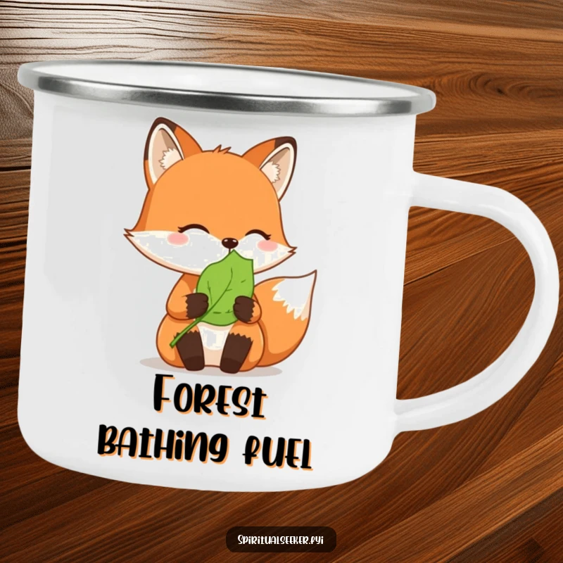Funny camping mug: A thoughtful fox holds a serene leaf, perfect for enjoying beverages outdoors.
