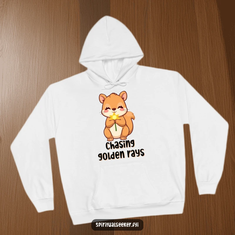 Funny squirrel hoodie depicting a cute squirrel holding a soft, golden ray, offering warmth and humorous cheer.