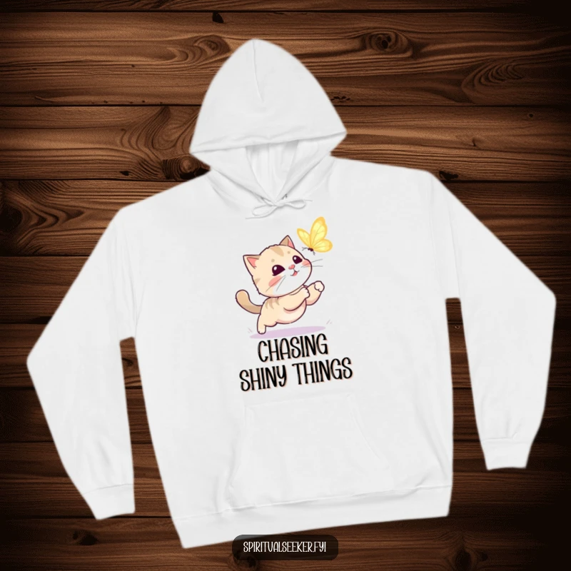 Funny kawaii cat hoodie depicting a cute feline in a spirited, playful chase after a luminous butterfly, radiating fun.
