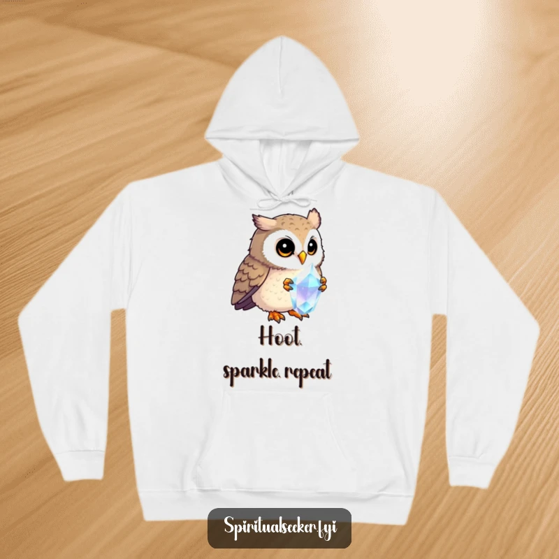 Funny curious owl hoodie, featuring an owl captivated by a shimmering crystal. Offers warmth, comfort, and a touch of mystical humor.