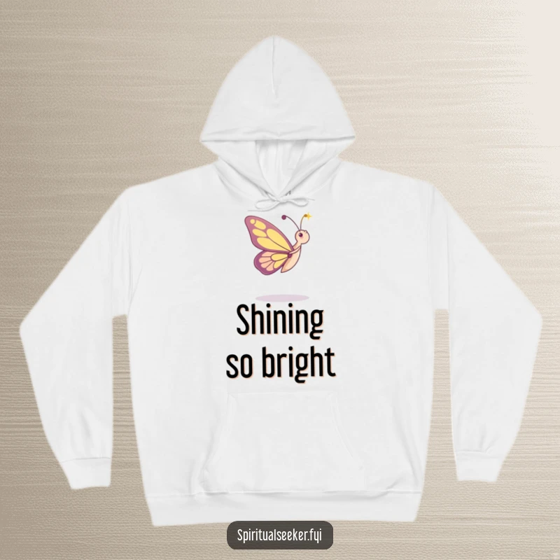 Funny hoodie featuring a dancing butterfly character admiring a beam of light, perfect for cozy moments of whimsical delight.