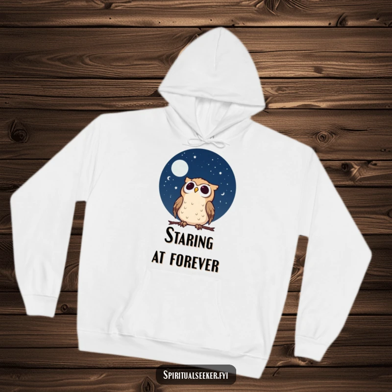Funny calm owl hoodie with a character gazing at a starry night sky with wonder, offering cozy comfort and cosmic humor.